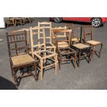 Assorted cane seated chairs, some in need of repair