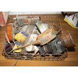 A box of assorted vintage car parts, radio, lamps, oil cans