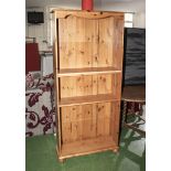 A pine open bookcase