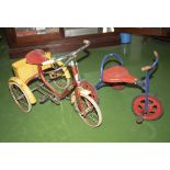 A small vintage tricycle and a Raleigh tricycle