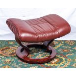 A leather Modern Stressless footstool