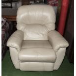 A cream leather reclining armchair