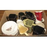 A box of assorted breweriana water jugs and ashtrays