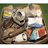 A box of assorted vintage car accessories