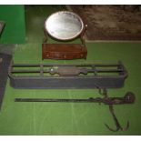 A mahogany toilet mirror, fire curb and a Antique butcher's steelyard iron, weighing instrument