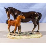 A Beswick horse and foal figure group