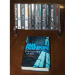 Twelve Ian Rankin paperback books and one hardback book