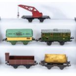 French Hornby O Gauge Crane Truck, Covered Wagon, Luggage Van, Cattle Wagon and a Tipping Wagon,
