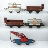 Five French Hornby wagons, two ESSO tanker, two cattle wagons, and a crane wagon