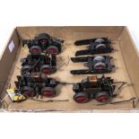 A box of O gauge locomotive motors and other items