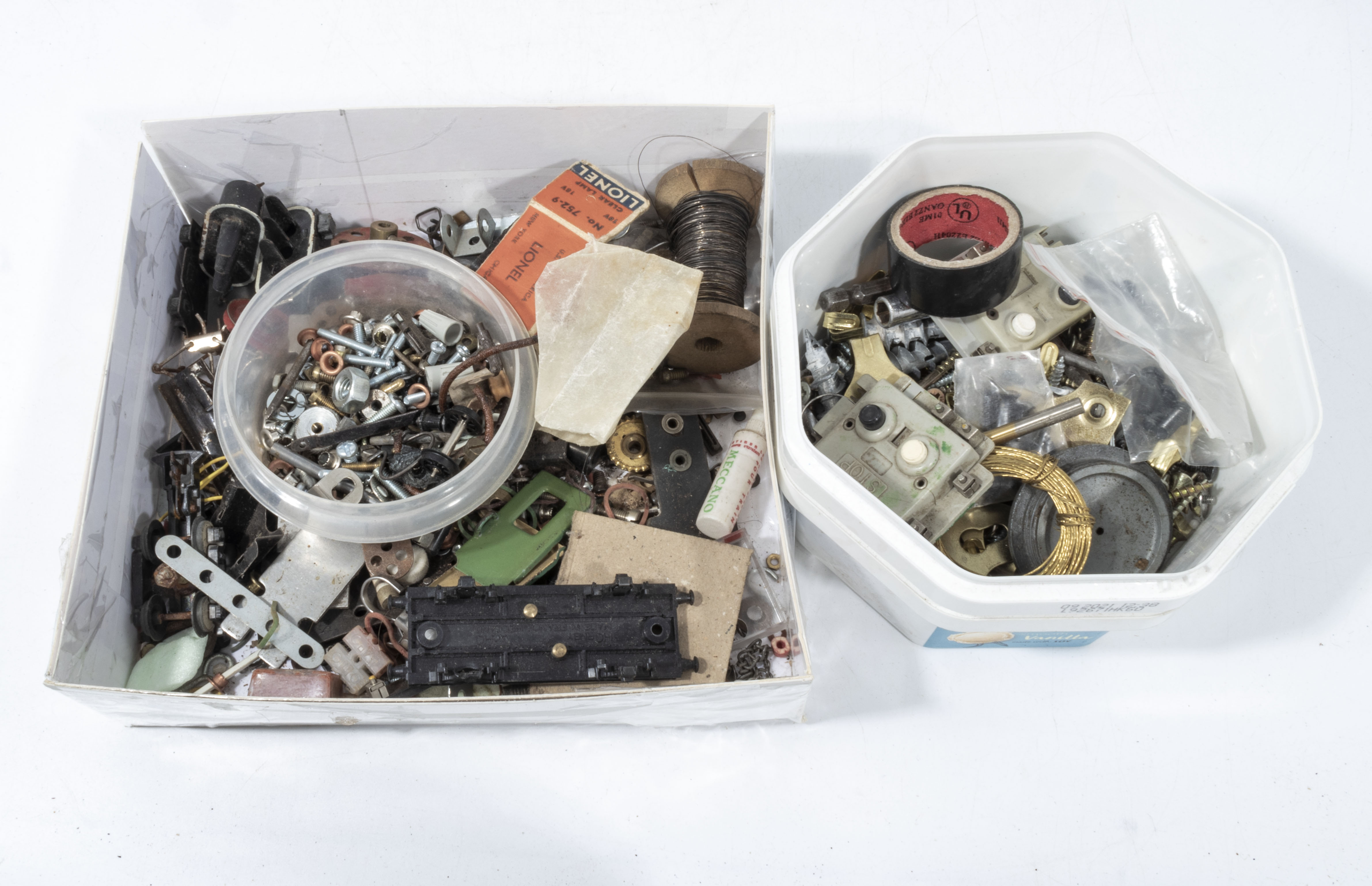 Two small boxes containing, assorted locomotive and wagon spares, screws, nuts and other items