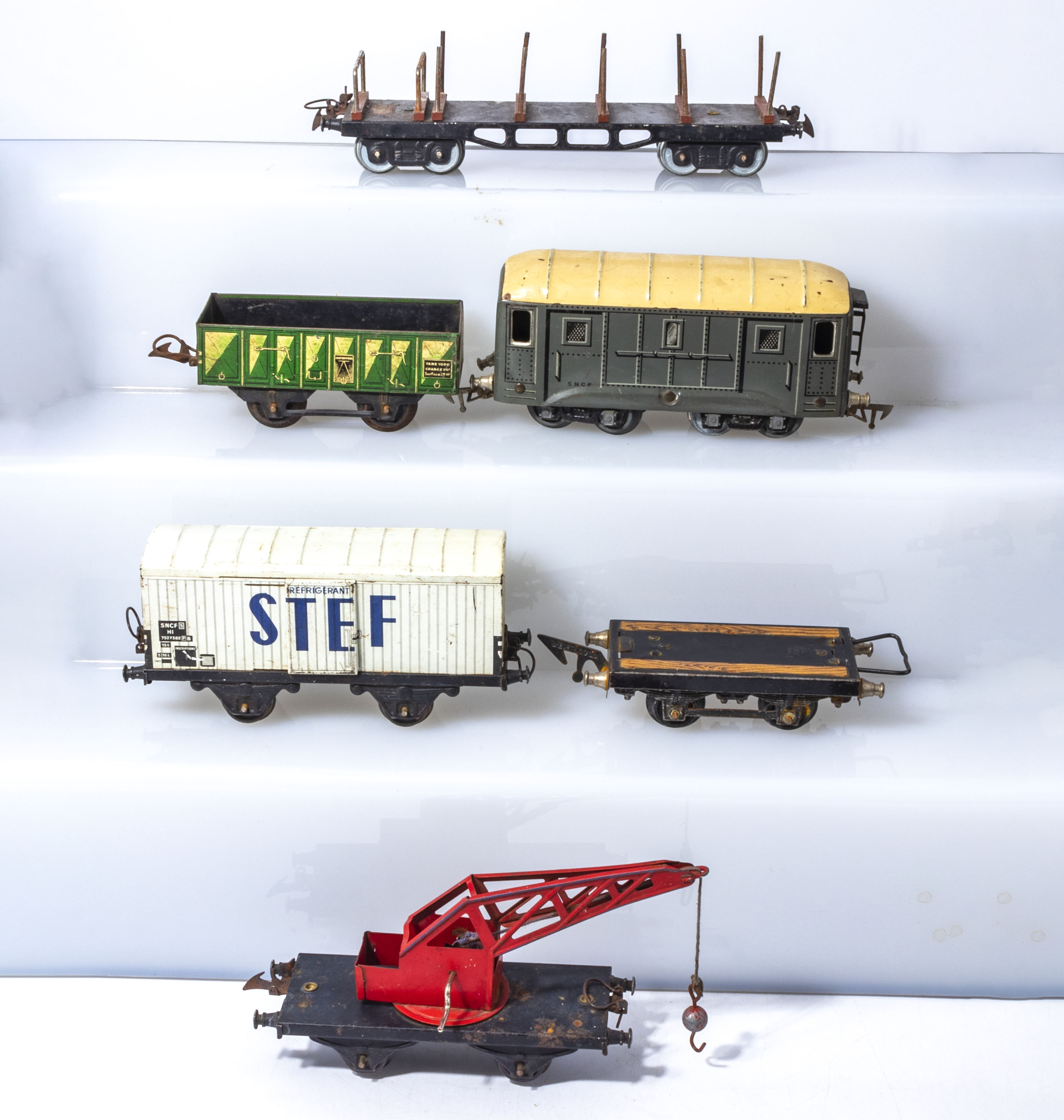 Vintage Hornby O gauge log wagon, dumper wagon, coach, refrigerated van, Jep flat bed and a crane