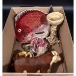 A box containing a fish plate, Hereford bull and candle holders