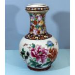 A large Chinese porcelain vase decorated with flowers on a white ground, 52cm tall