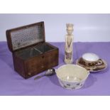 An oak tea caddy, ivory figure, Belleek dish and a cup and saucer