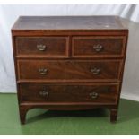 A small Georgian mahogany chest of two over two drawers. Provenance: Being the property of the