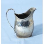 A silver cream jug marks for London 1929, 90gms