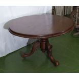 A Victorian mahogany round loo table.