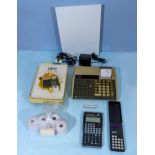 Vintage Hewlett Packard 97 calculator with instruction books, memory cards, cables together with