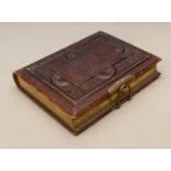 A leather bound photograph album