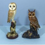 Two carved wooden owls