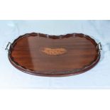 An Edwardian inlaid mahogany, kidney-shaped tray.