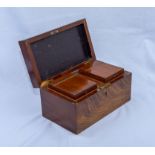 A mahogany tea caddy