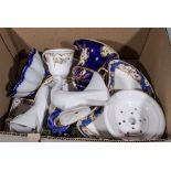 A box of pottery and china