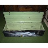 A vintage metal military trunk