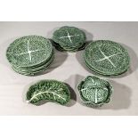 A quantity of Portugal cabbage leaf plates and dishes