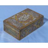 An Asian cigarette box, brass inlaid with white metal and copper