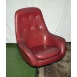 A vintage 1960s Red Swedfurn swivel lounge chair