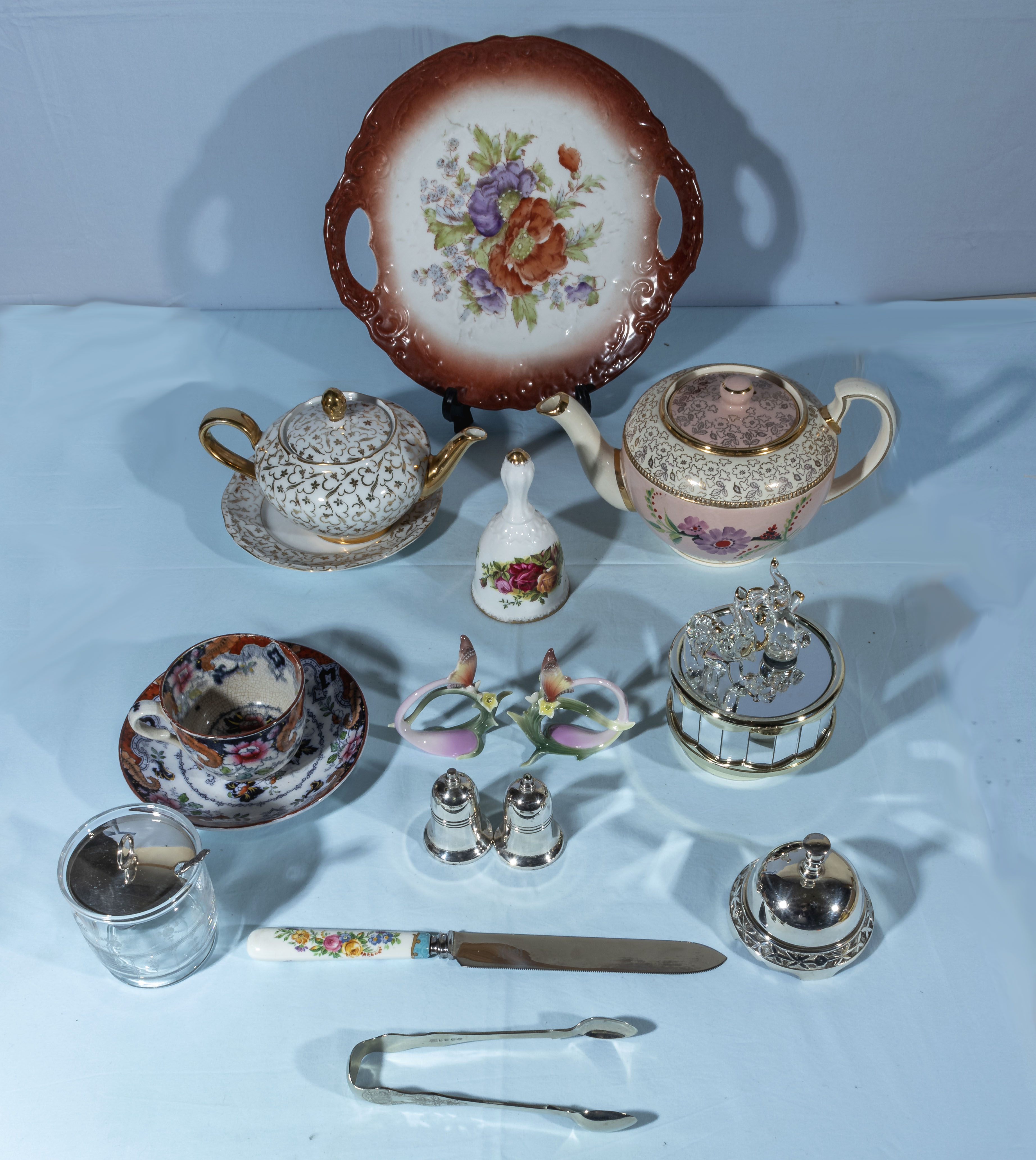 A box containing pottery and glassware