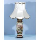 A Chinese style pottery table lamp and shade