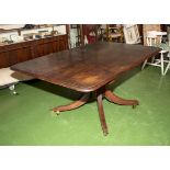 A Regency mahogany dining table