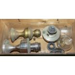 Three oil lamps and parts