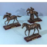 Three metal horses, Red Rum, Shergar and Desert Orchid