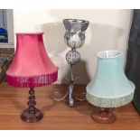 Two table lamps and a candle holder