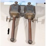 A pair of copper wall/carriage lamps