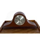 A mahogany mantle clock