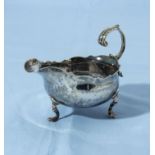 A small silver cream jug, marks for London 1812, I.M. 118gms