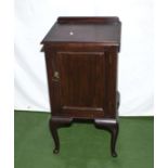 An Edwardian mahogany bedside cabinet.