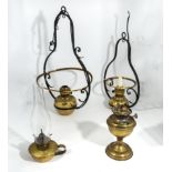 Two hanging oil lamps and two small oil lamps