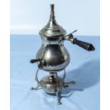 An Arts and Crafts hammered pewter spirit coffee pot