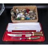 A carving set and a box of assorted collectable items