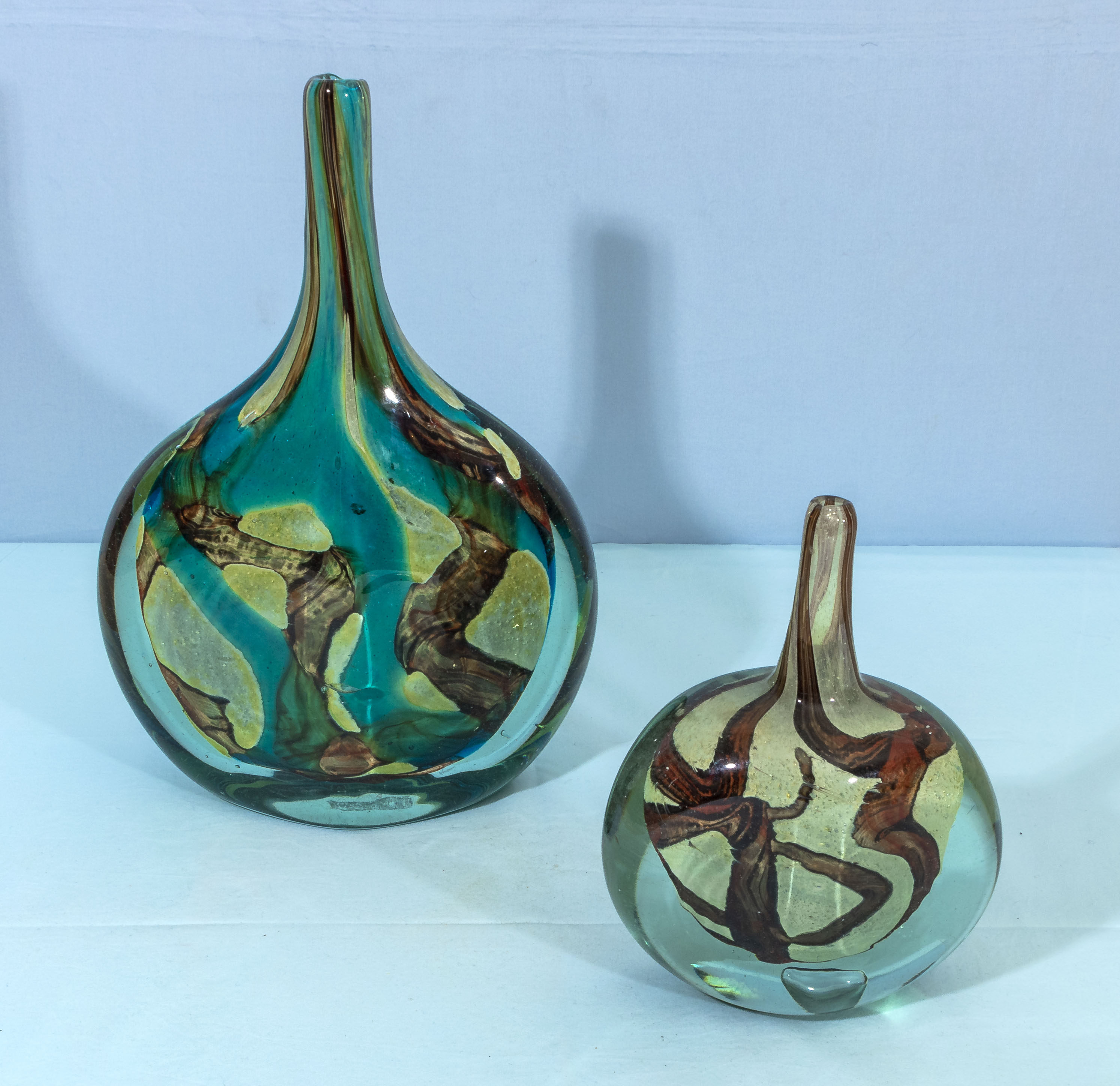 Two Medina glass vases, 27cm and 18cm tall