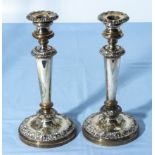 A pair of silver plate on copper candlesticks, 25cm tall