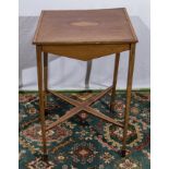 An Edwardian inlaid mahogany table