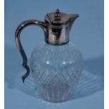 A silver topped claret jug, marks for Birmingham 1909, makers mark JS&S. 20cm tall