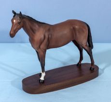 A Royal Doulton figure of a horse